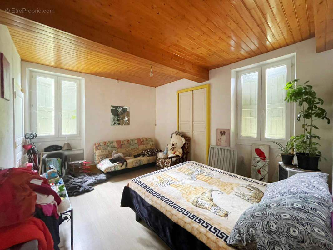 chambre bedroom 1 - Maison à LA SAUVETAT