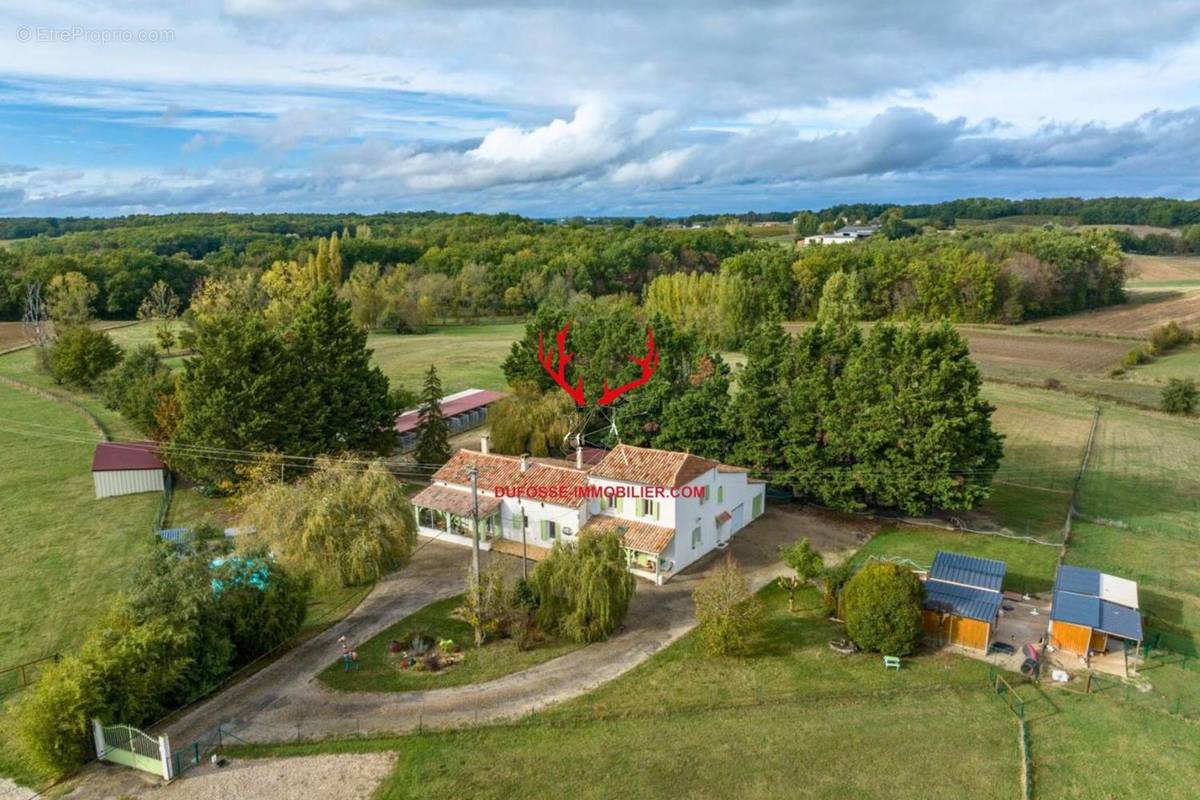 Photo 1 - Maison à SAINT-ASTIER