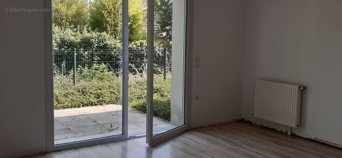 Chambre donnant sur jardin - Appartement à REIMS