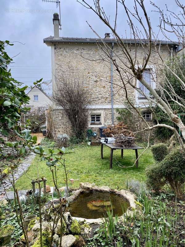 Façade arrière - Maison à COULOMMIERS