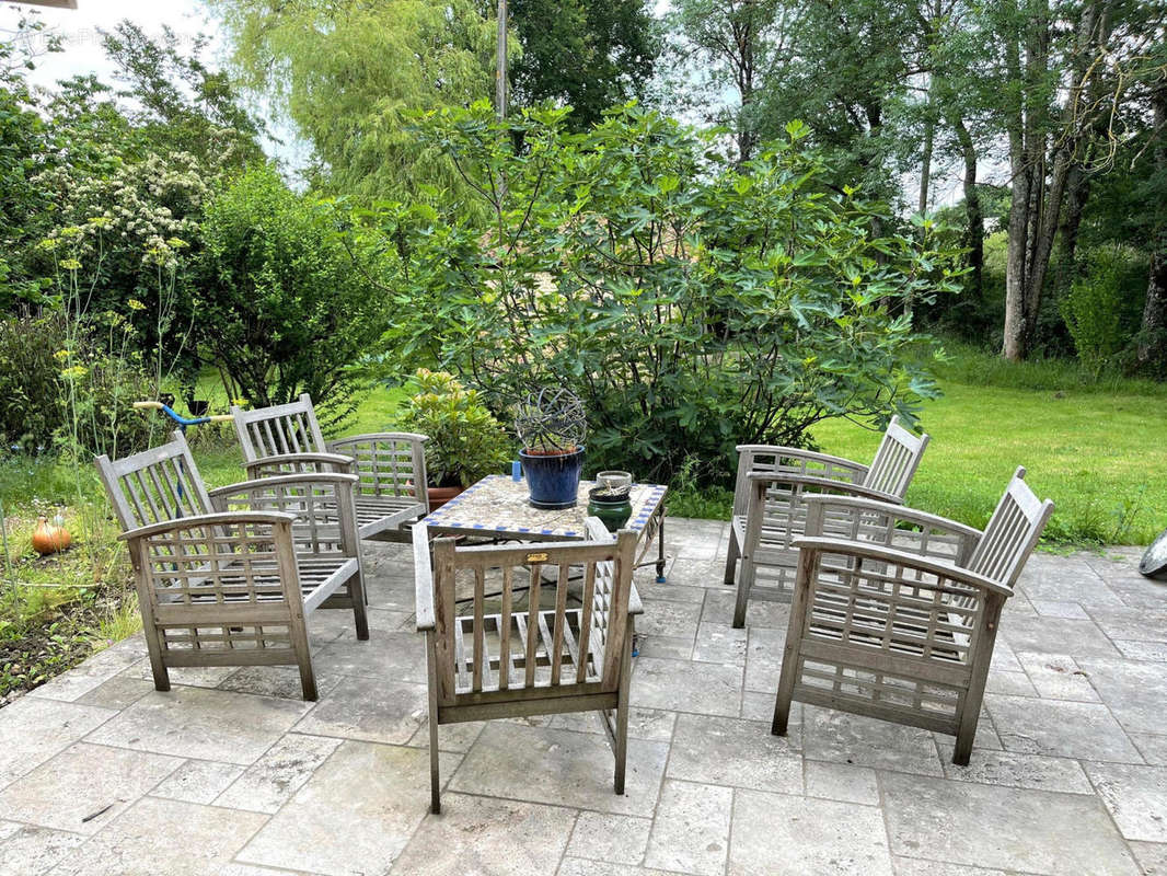 terrasse en travertin - Maison à MARCIAC