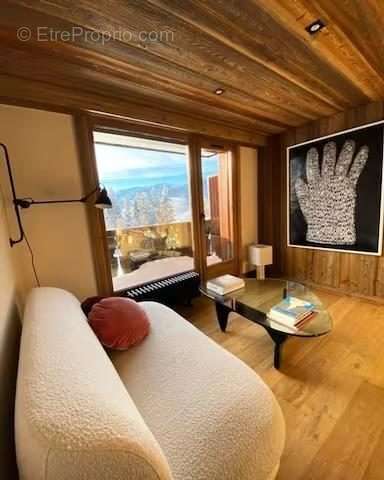 Salon avec balcon  - Appartement à MEGEVE