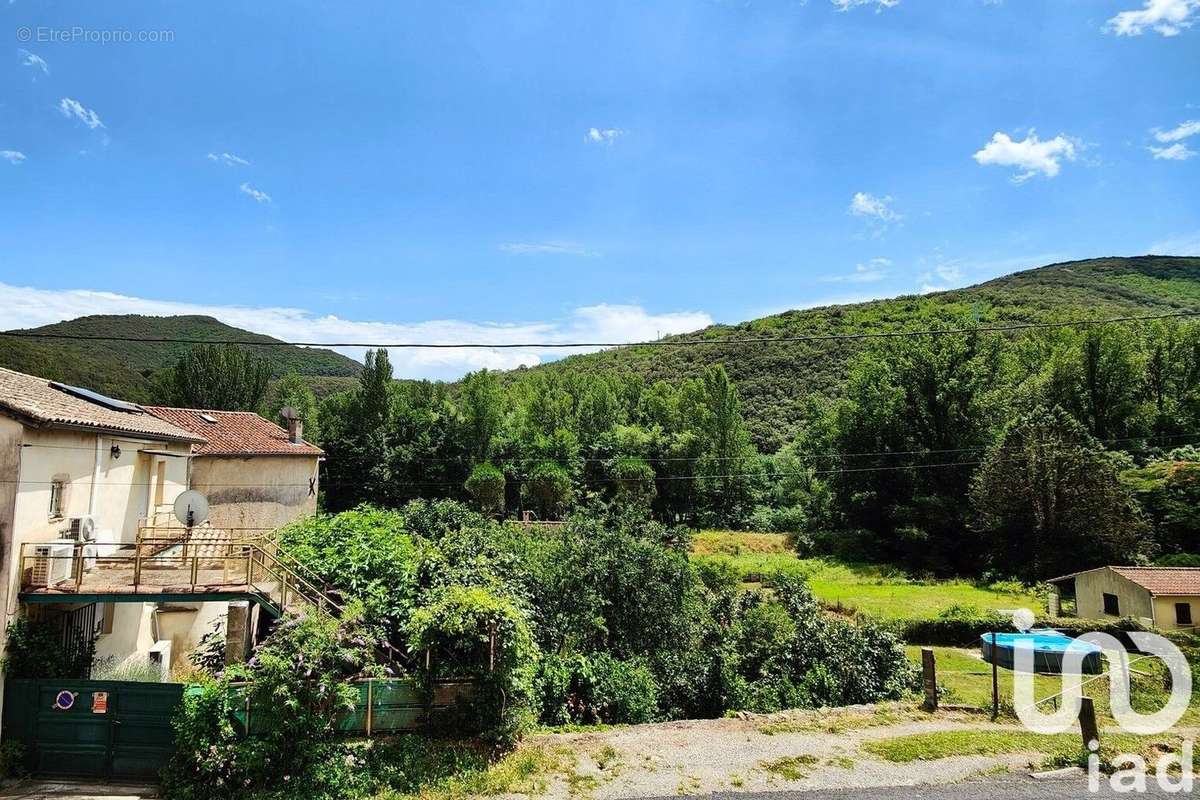 Photo 2 - Maison à SAINT-ETIENNE-ESTRECHOUX