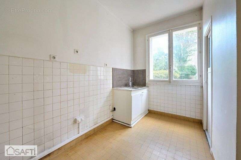 Photo 4 - Appartement à COURBEVOIE