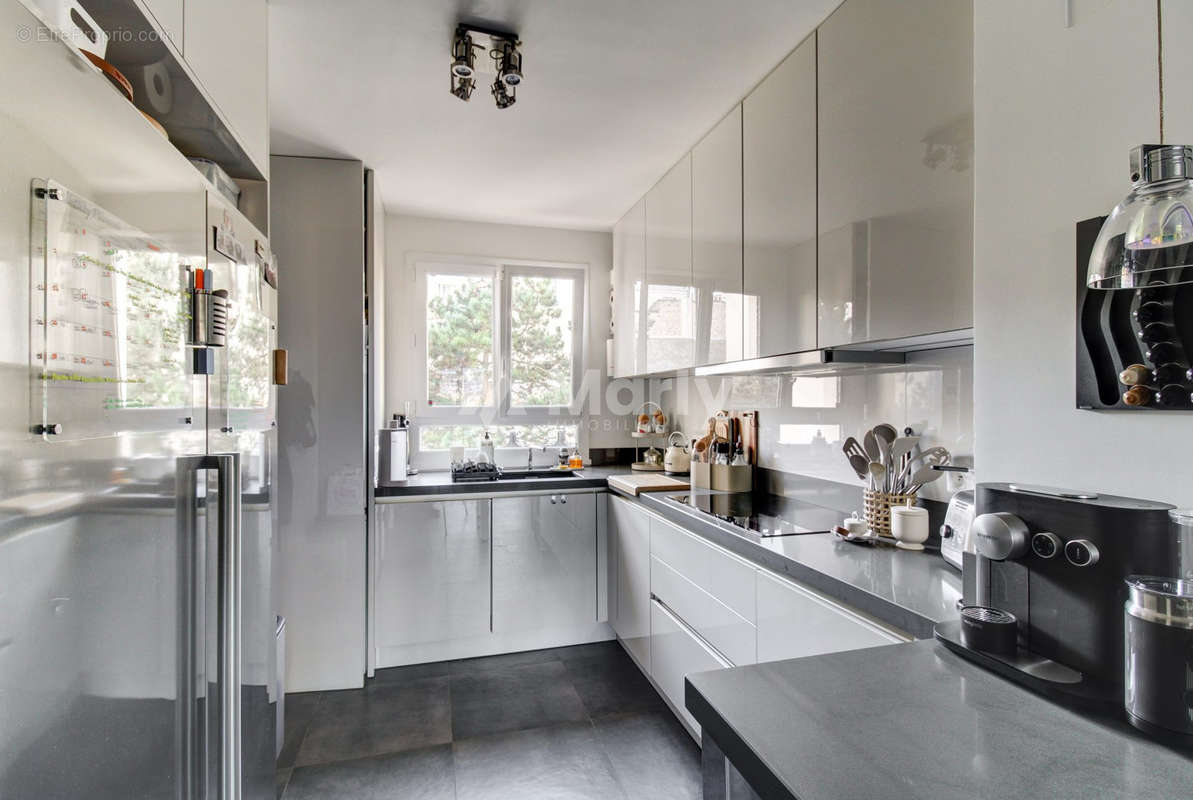 Cuisine équipée et aménagée  - Appartement à BOULOGNE-BILLANCOURT