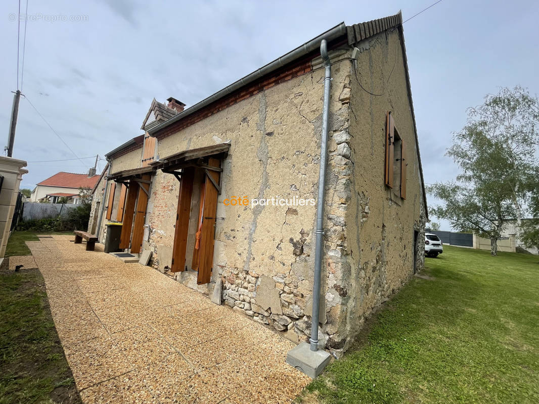 Maison à REIGNY