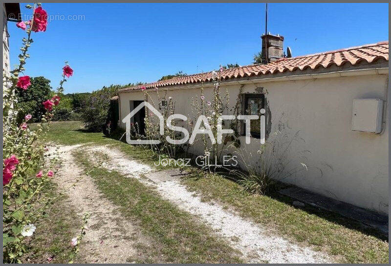 Photo 1 - Maison à BOURCEFRANC-LE-CHAPUS