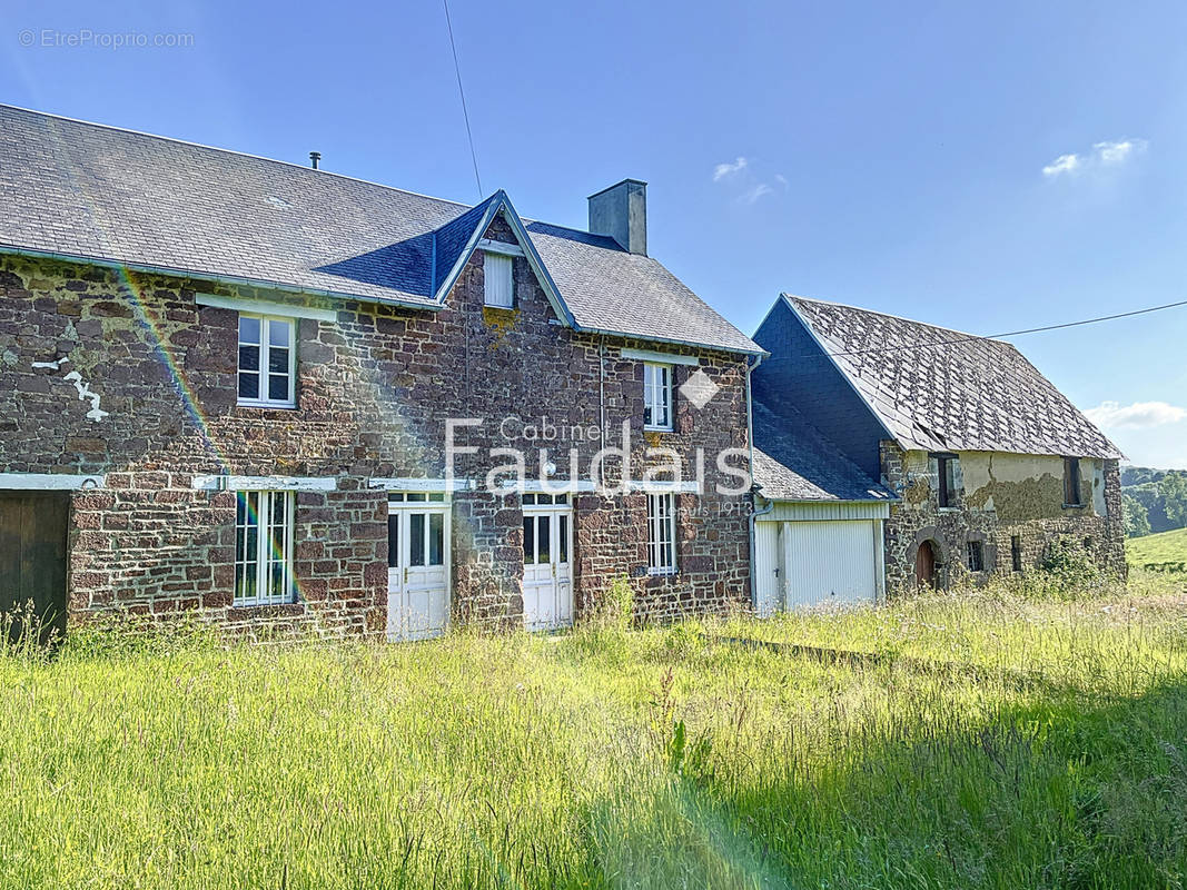 Maison à NOTRE-DAME-DE-CENILLY