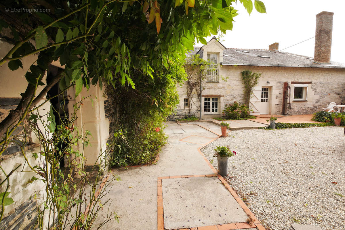 Maison à CORNE