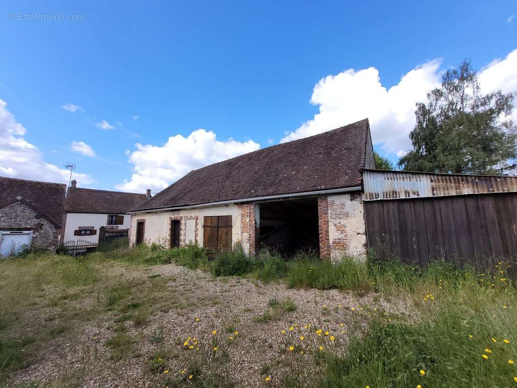 Maison à MANOU