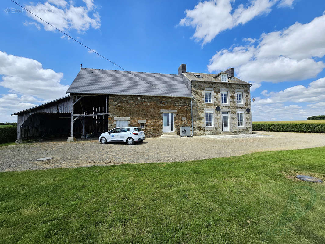 Maison à CONDE-SUR-NOIREAU