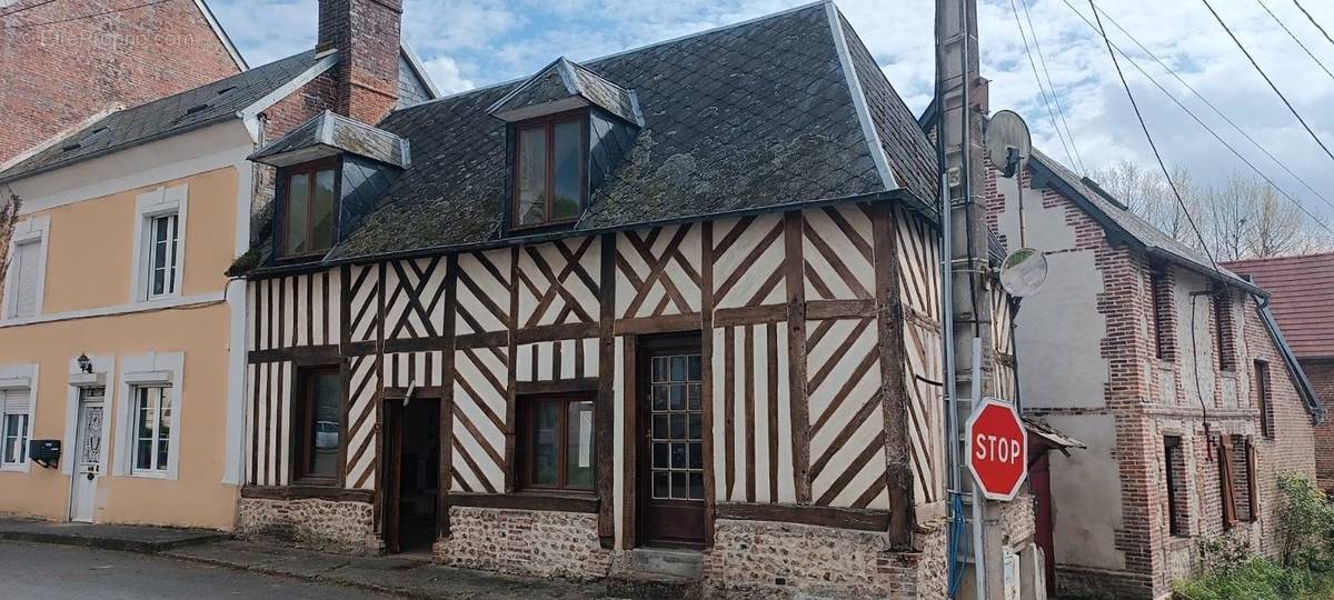 Maison à COURTONNE-LES-DEUX-EGLISES