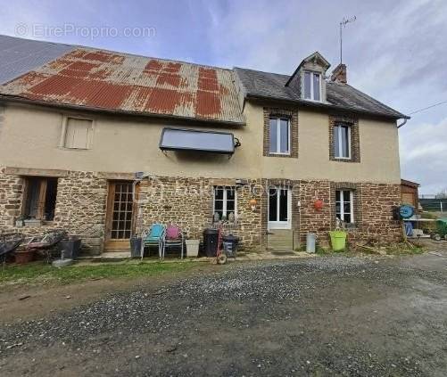 Maison à NOTRE-DAME-DE-CENILLY