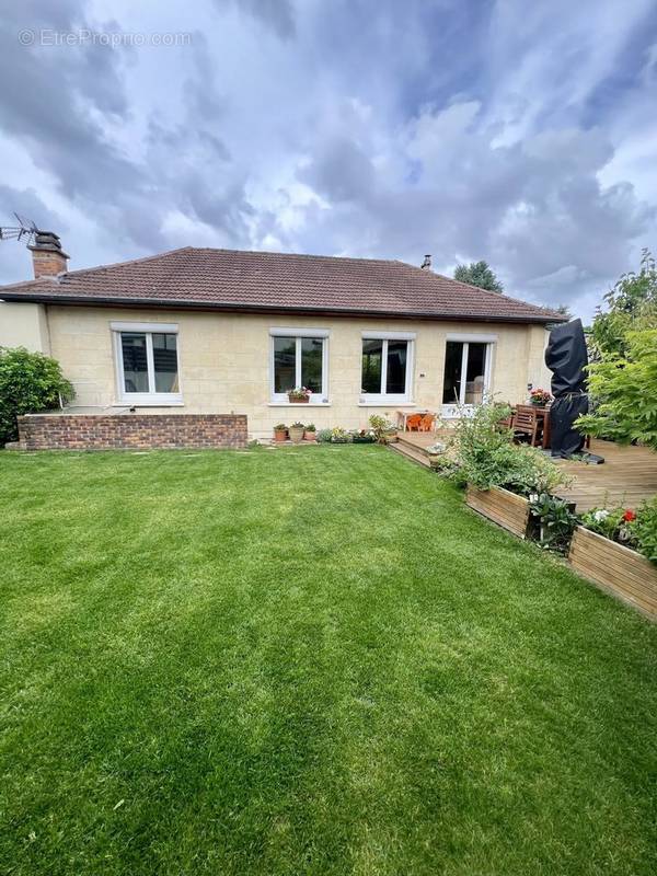 Jardin avec terrasse en bois - Maison à MONTMORENCY