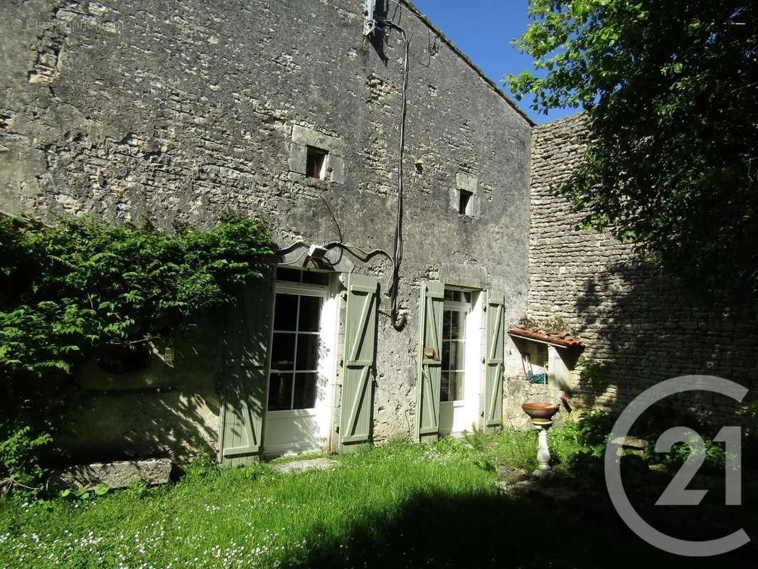 Maison à AUBIGNE