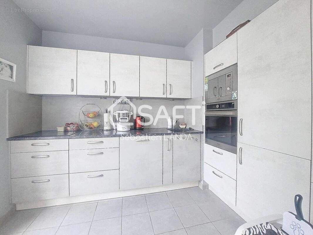 Photo 6 - Appartement à LE MESNIL-SAINT-DENIS