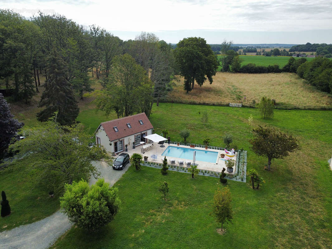 Maison à MANOU