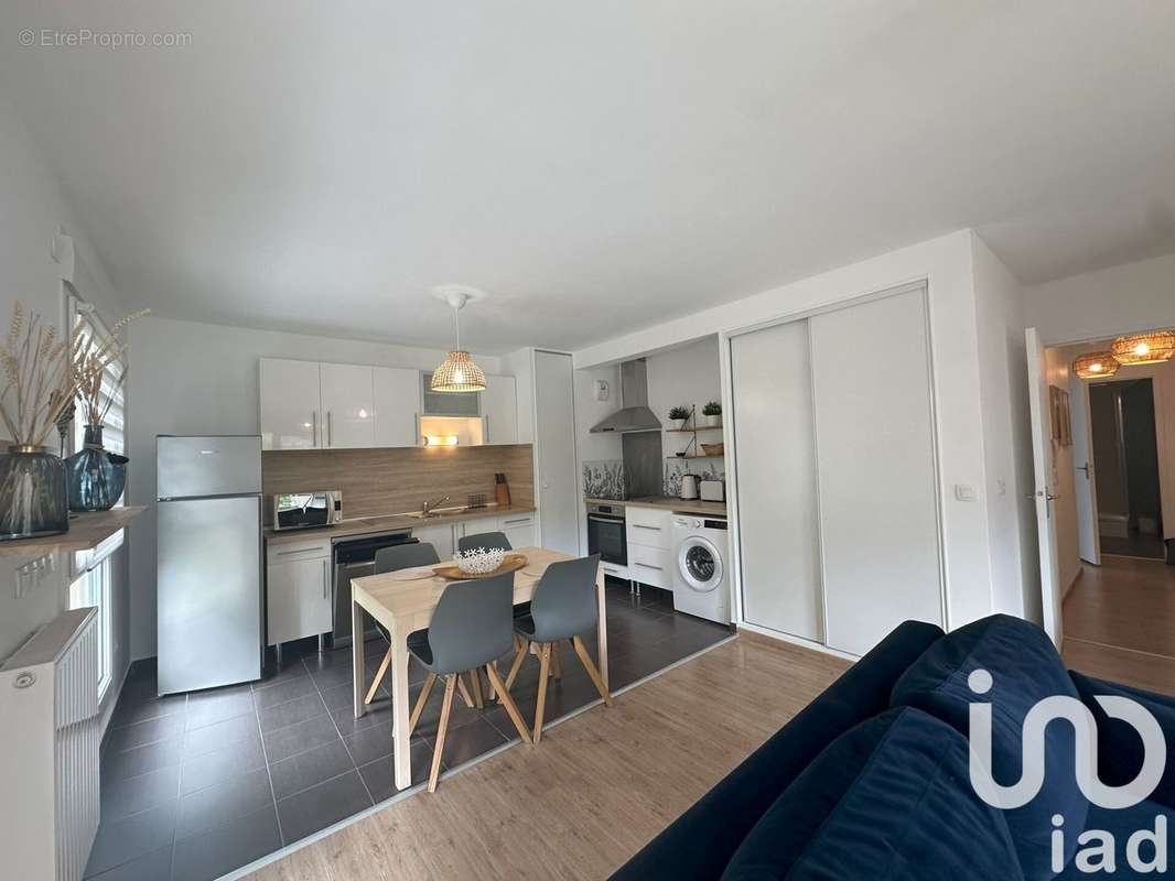 Photo 2 - Appartement à HEROUVILLE-SAINT-CLAIR