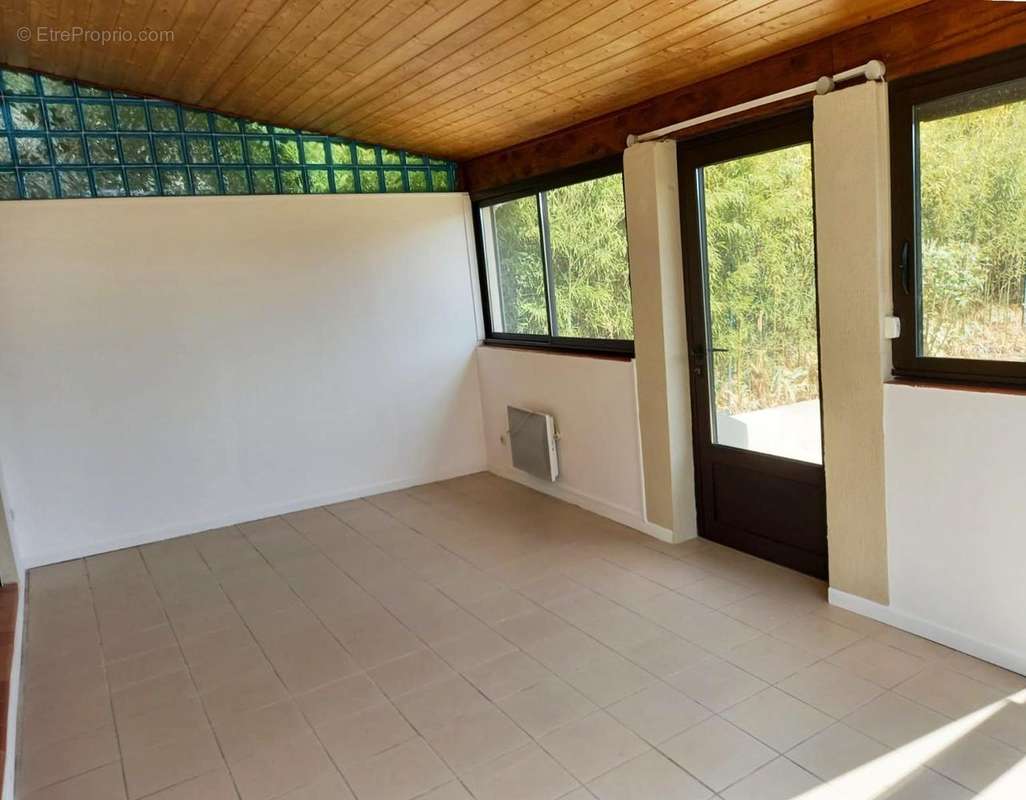 Véranda 20m² - Maison à LA BOUILLADISSE