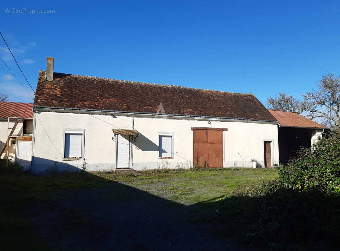 Maison à LUZILLE