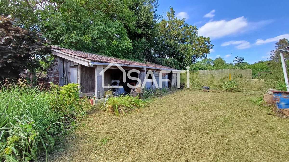 Photo 2 - Maison à LE MESNIL-SUR-BULLES