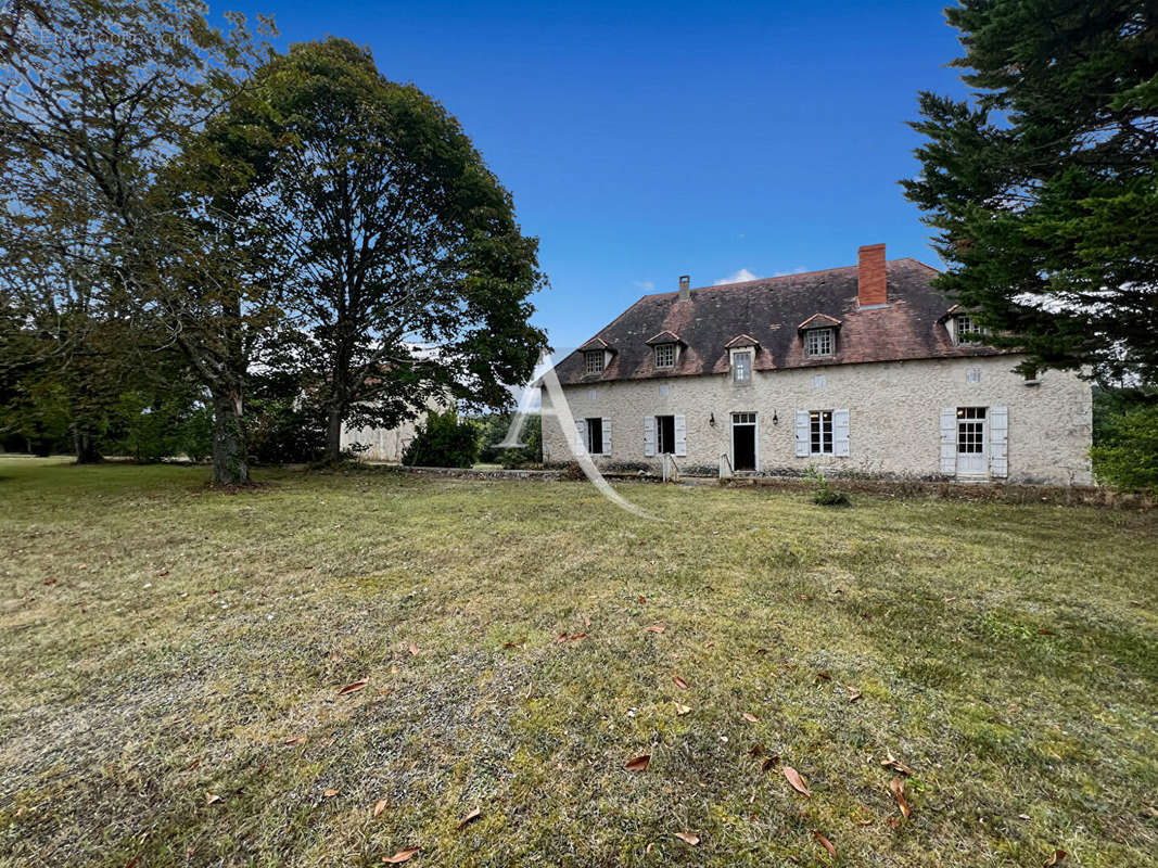 Maison à BEAUVILLE