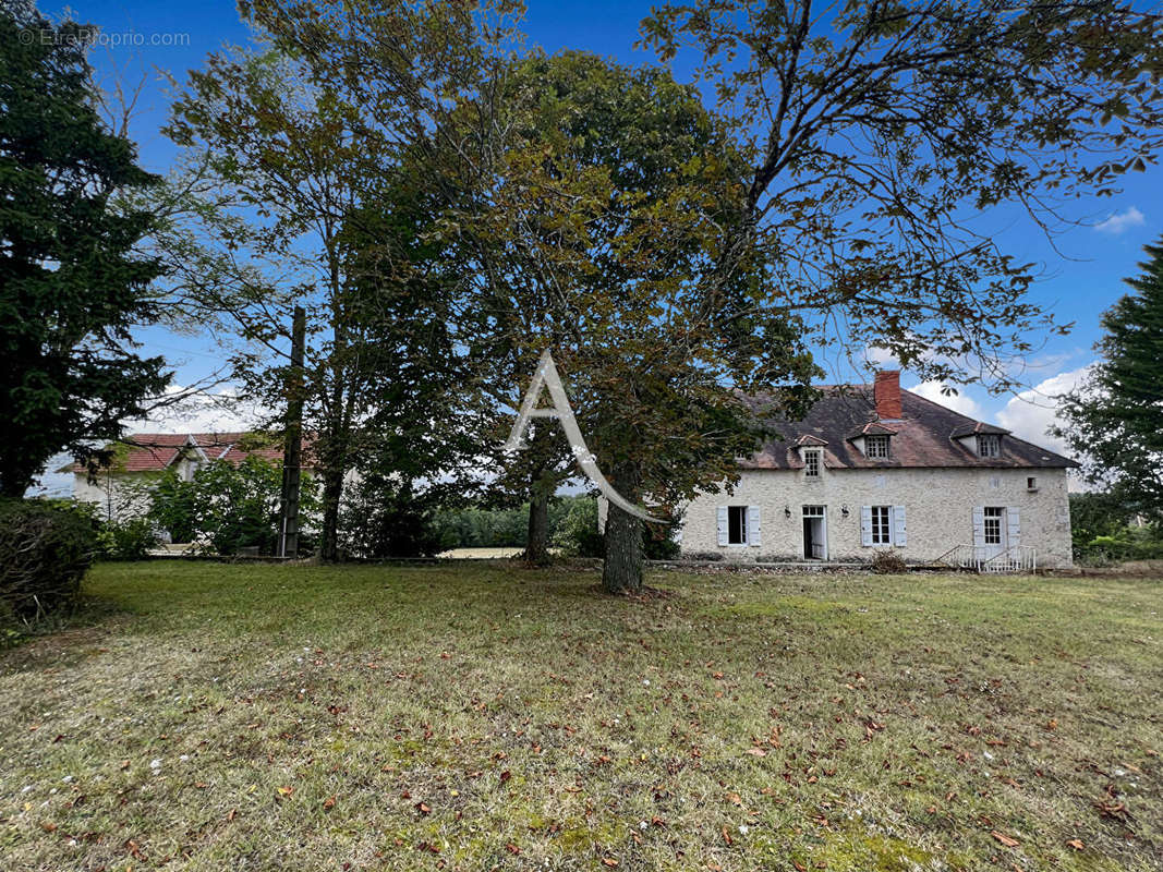 Maison à BEAUVILLE