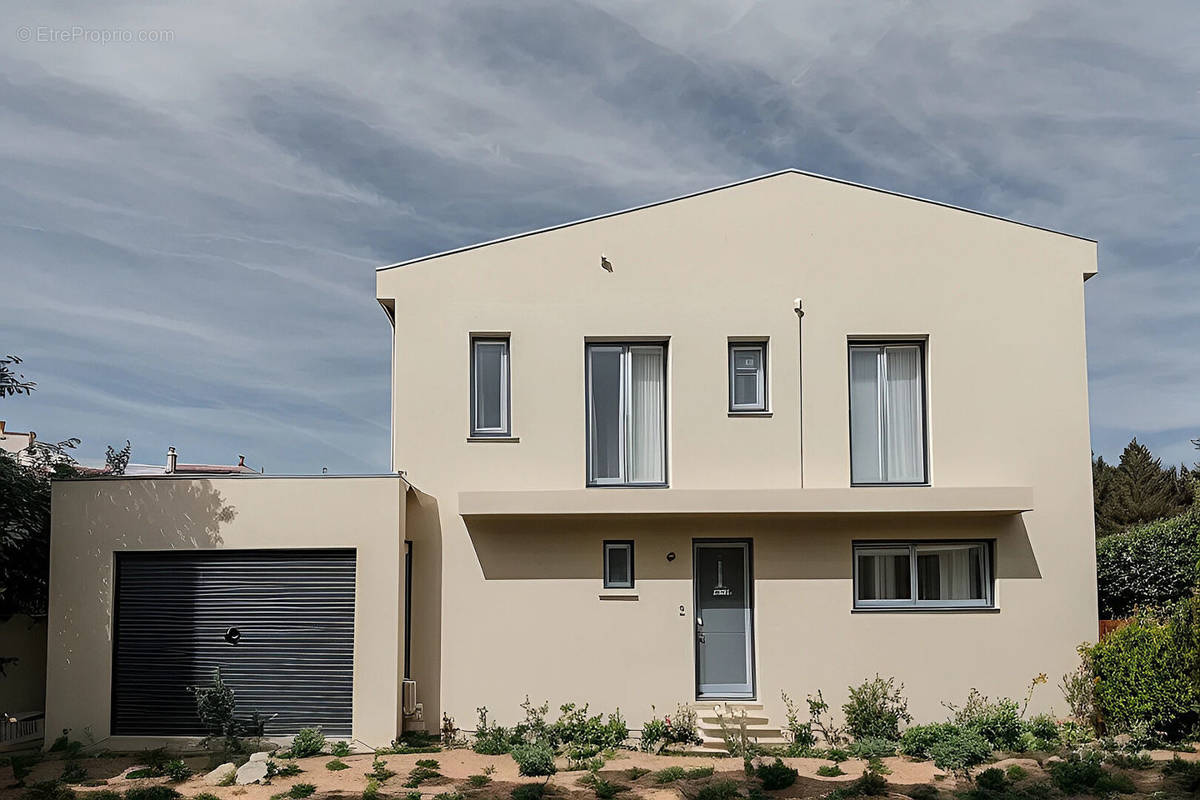 Maison à BOUGUENAIS