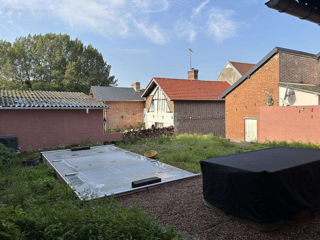 Maison à COURTONNE-LES-DEUX-EGLISES