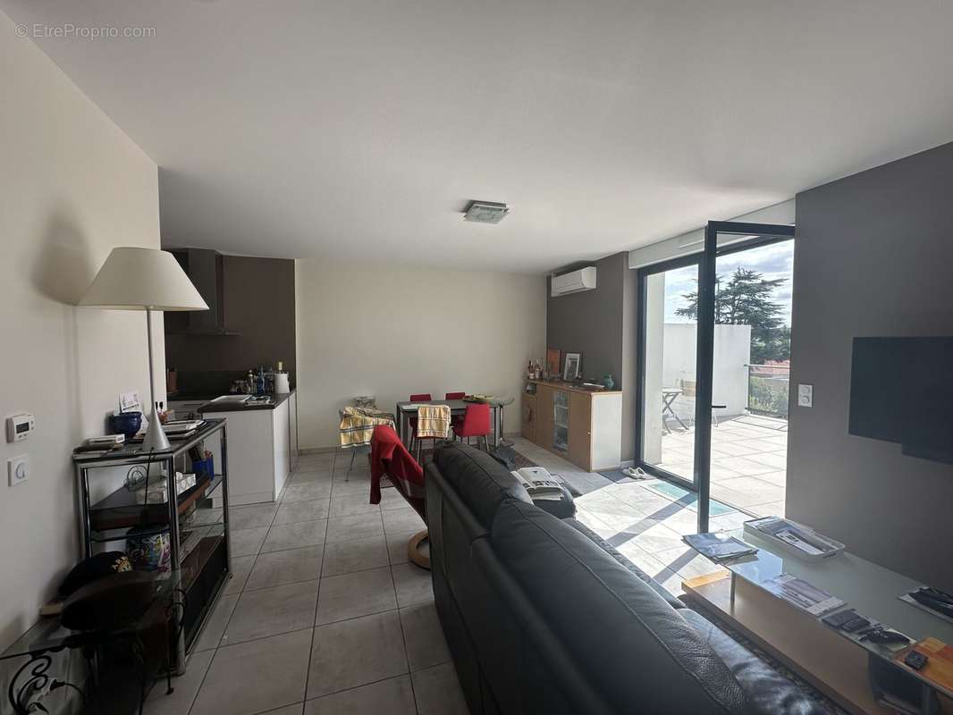 SALON AVEC VUE SUR TERRASSE - Appartement à VILLENEUVE-SUR-LOT