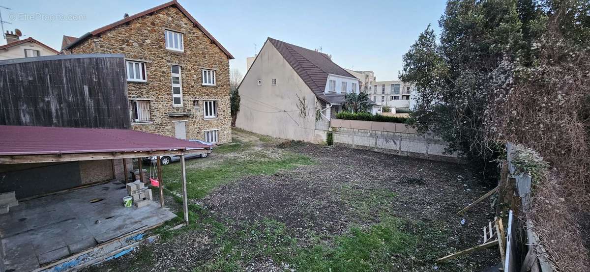 Vue arrière jardin du local - Commerce à MONTREUIL