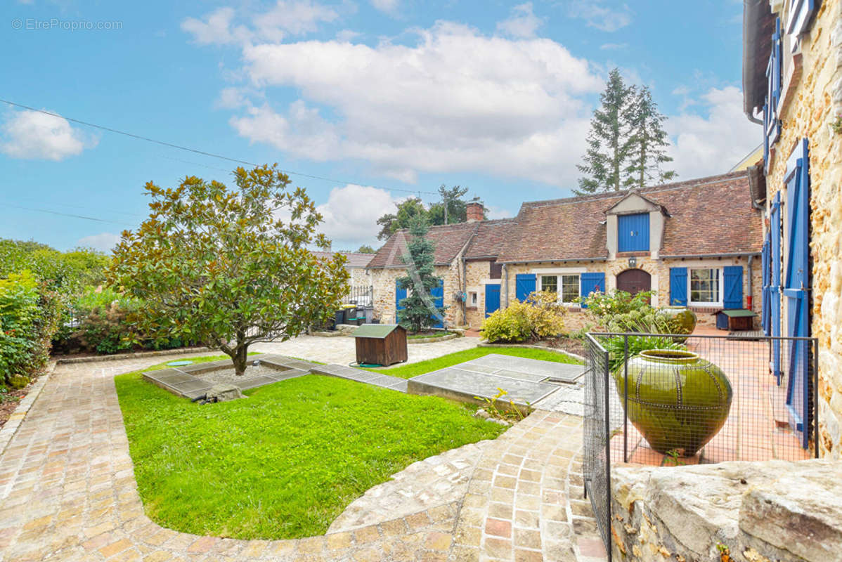 Maison à GUIGNES