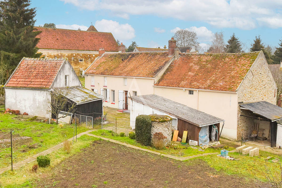 Maison à GUIGNES