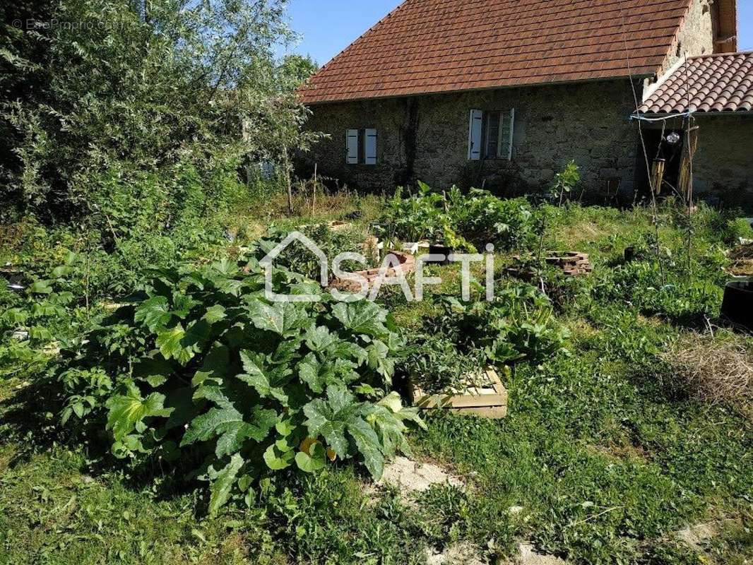 Photo 3 - Maison à LA CHAPELLE-MONTBRANDEIX