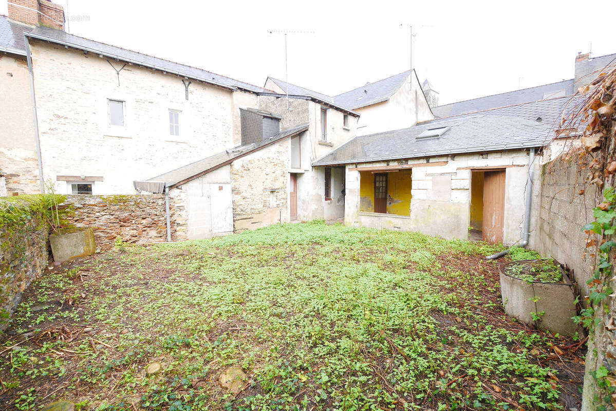 Maison à CHAMPIGNE