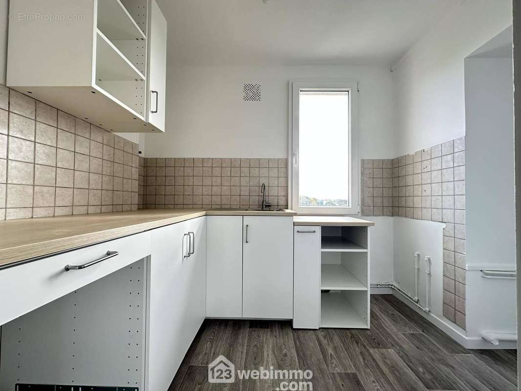 La cuisine aménagée et fonctionnelle - Appartement à LAON