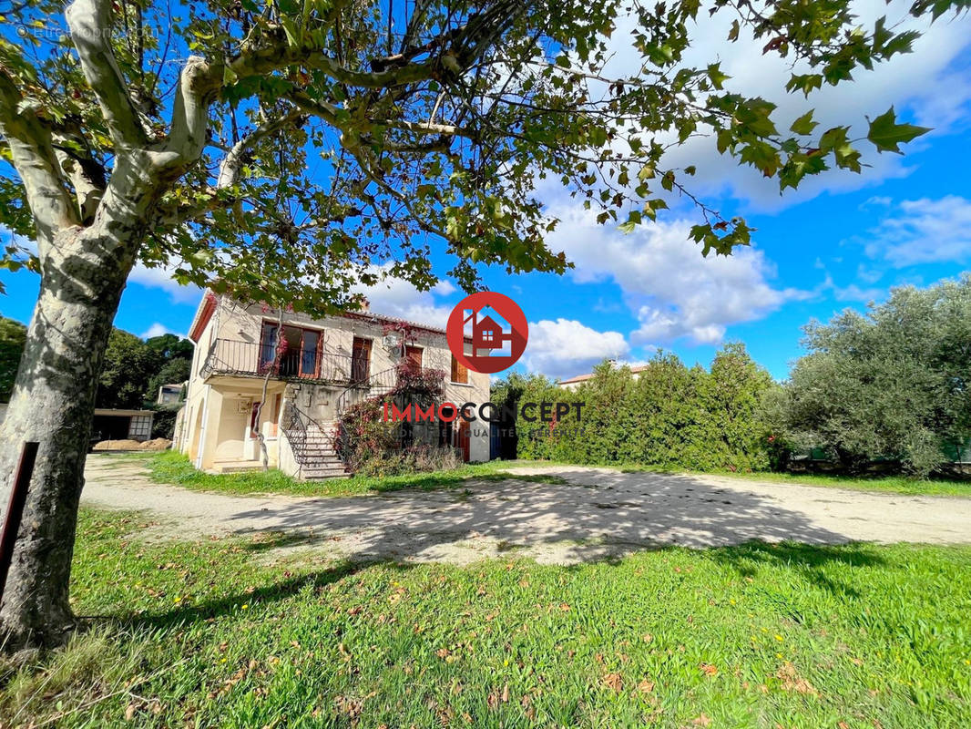 Maison à LAUDUN-L&#039;ARDOISE