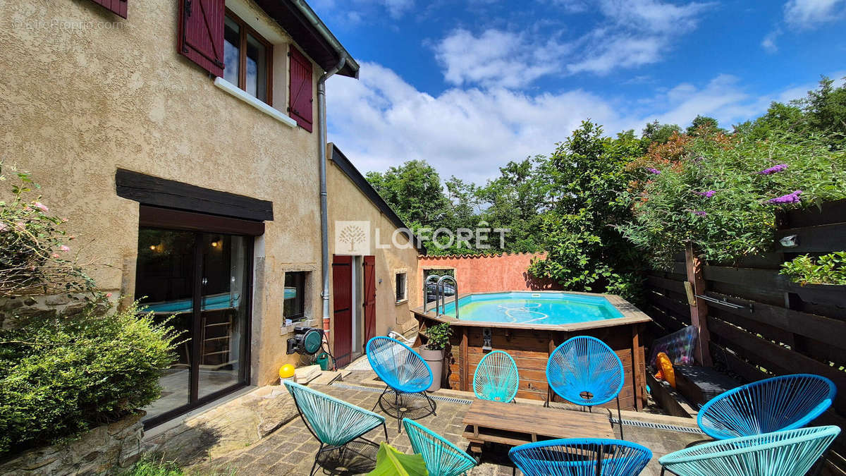 Maison à SOURCIEUX-LES-MINES