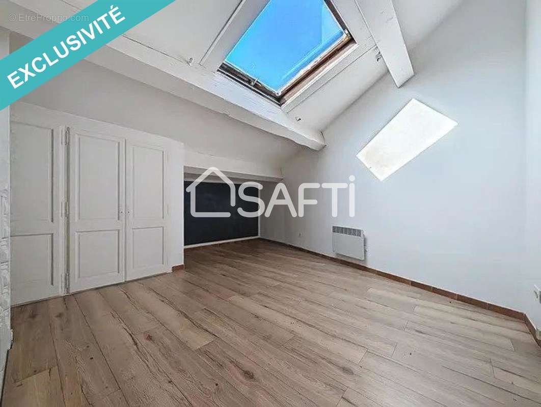 Photo 3 - Appartement à SAINT-MITRE-LES-REMPARTS