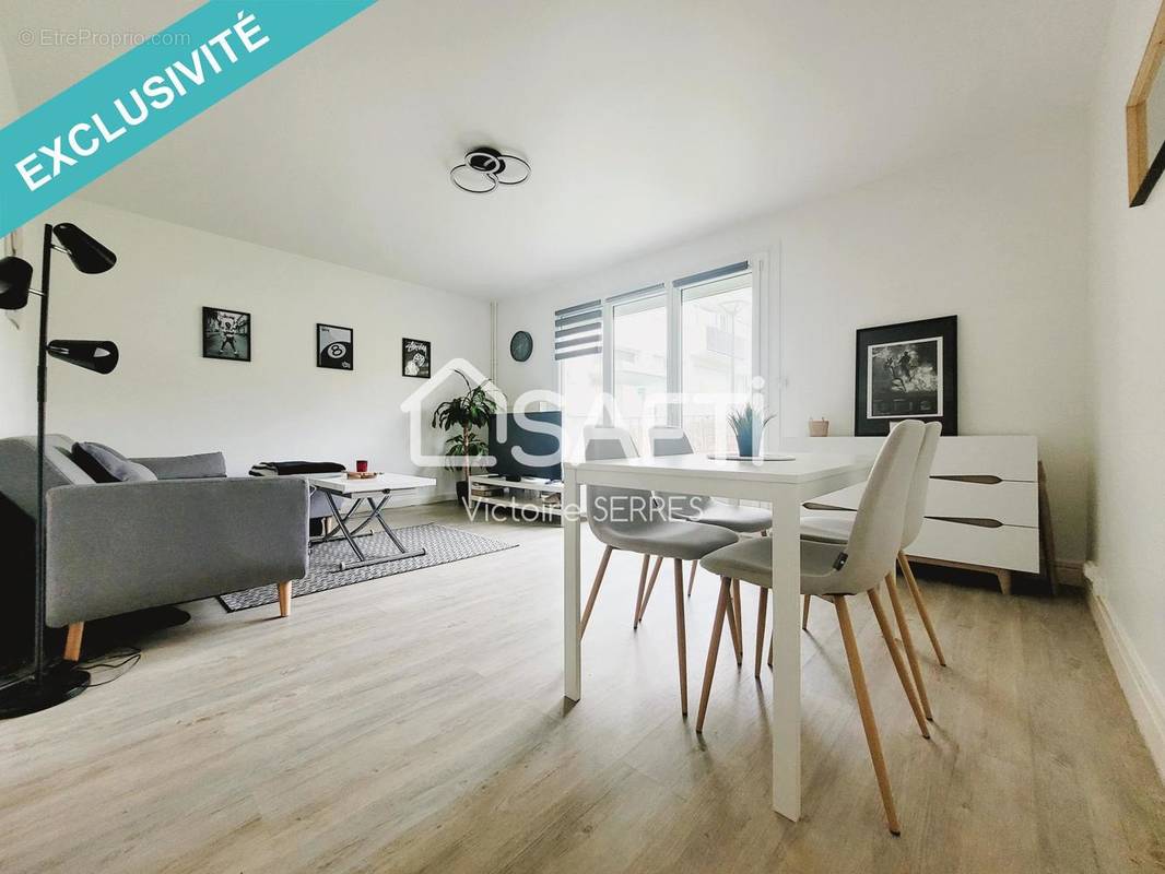 Photo 1 - Appartement à HEROUVILLE-SAINT-CLAIR