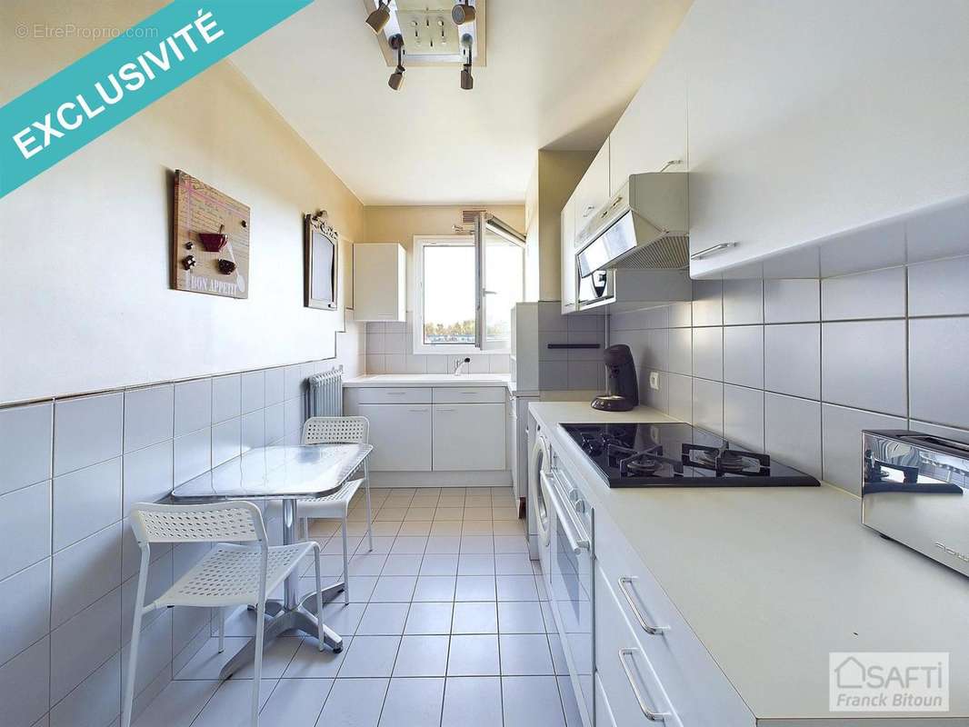 Photo 4 - Appartement à COURBEVOIE