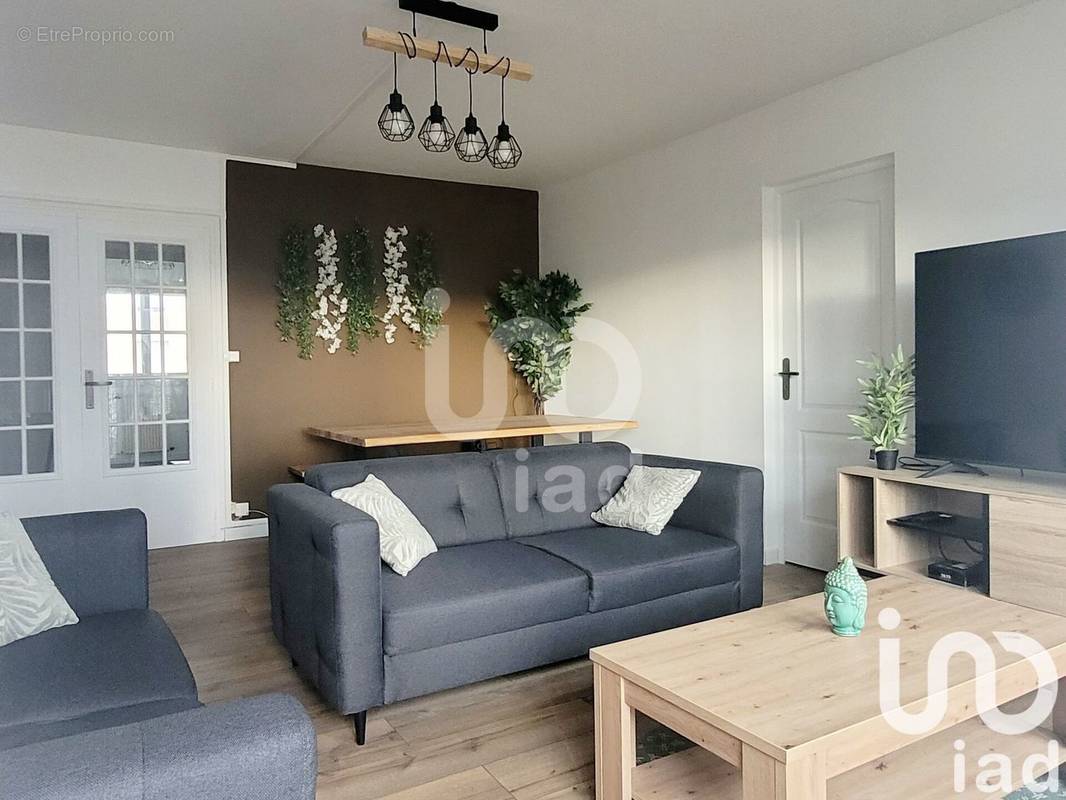 Photo 1 - Appartement à HEROUVILLE-SAINT-CLAIR