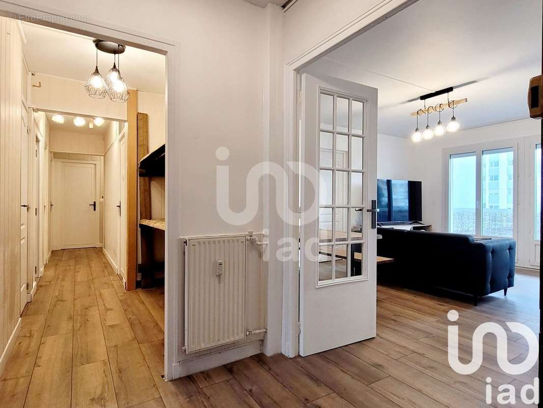 Photo 2 - Appartement à HEROUVILLE-SAINT-CLAIR