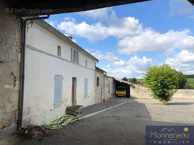 Maison à TOUZAC