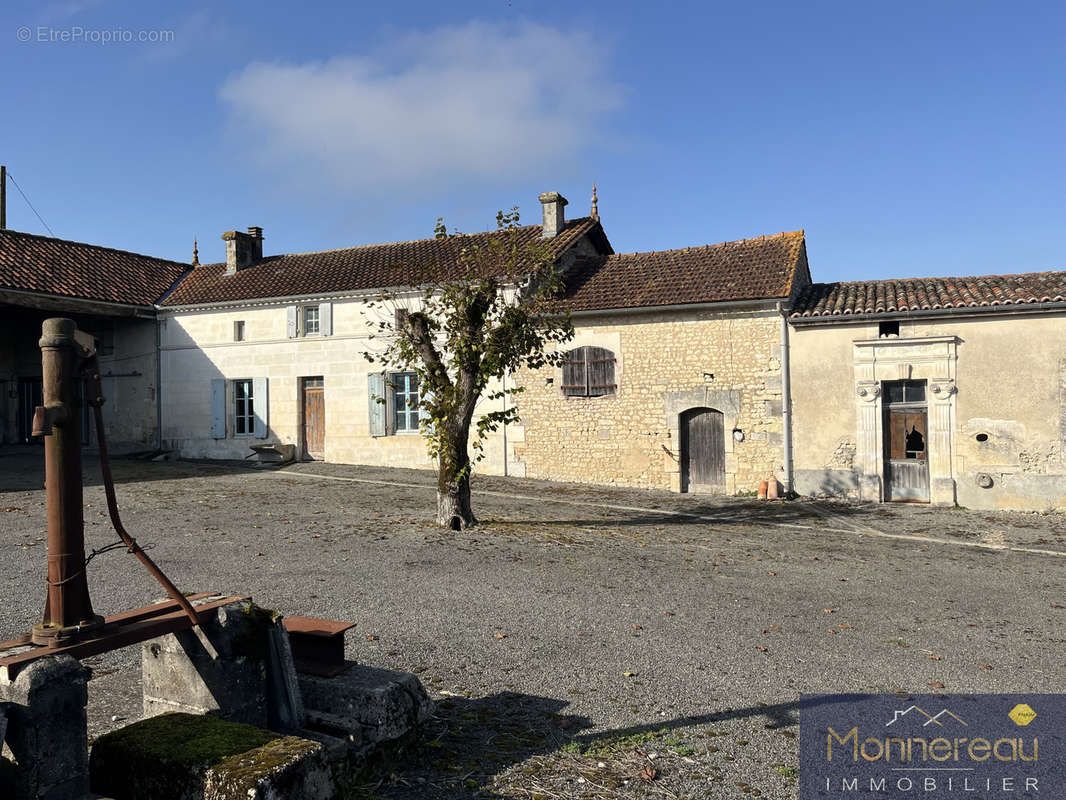 Maison à TOUZAC