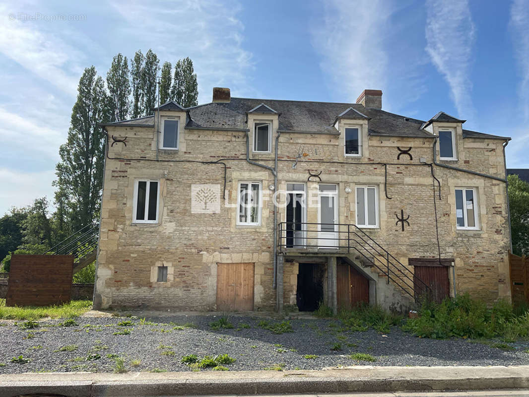 Maison à MEZIDON-CANON