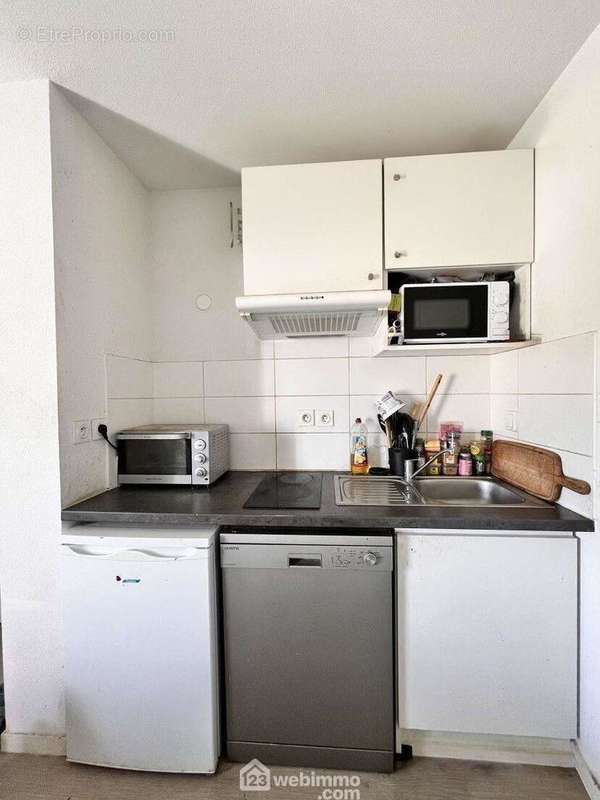 La cuisine ouverte sur le séjour... - Appartement à VILLENAVE-D&#039;ORNON