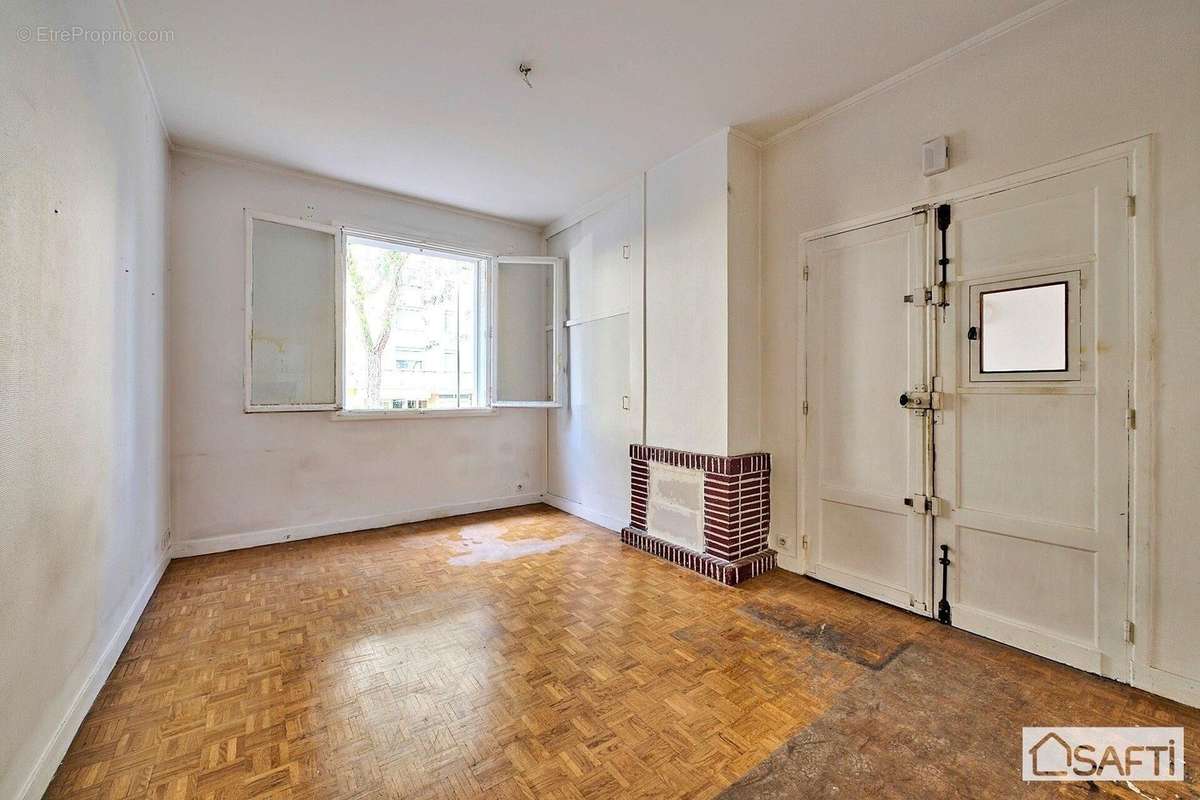 Photo 2 - Appartement à COURBEVOIE