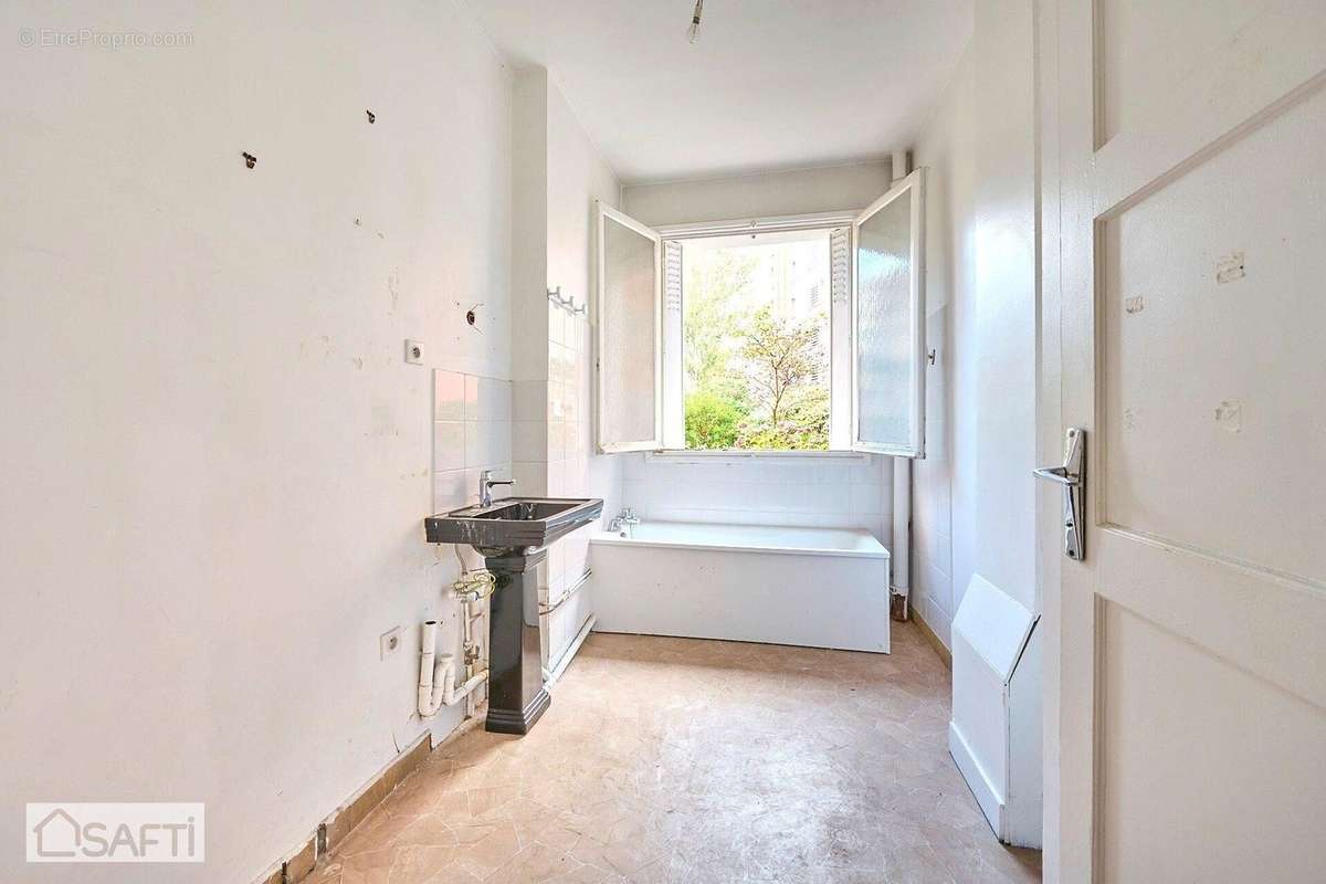 Photo 8 - Appartement à COURBEVOIE