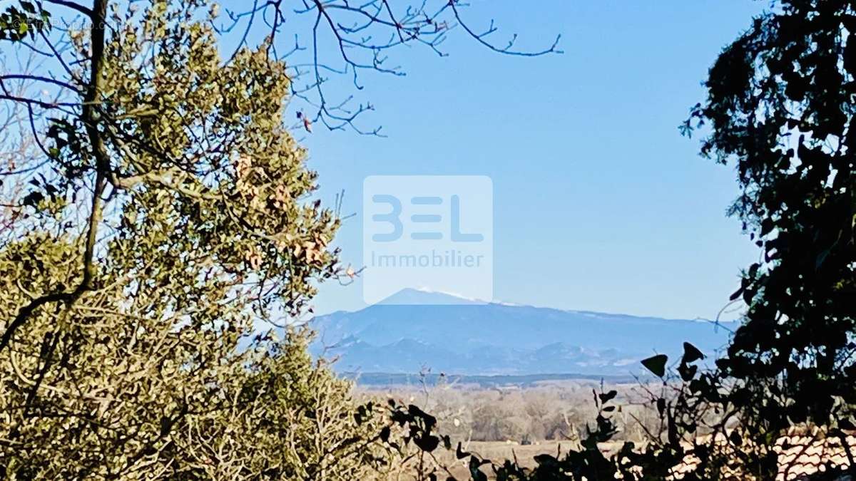 Terrain à LAUDUN-L&#039;ARDOISE